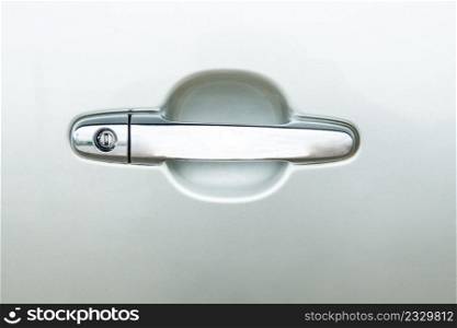 close up handle door car and silver color lock