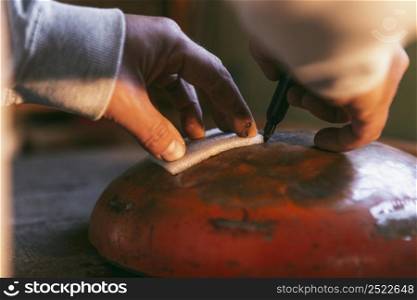 close up hands doing artisan work