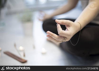 Close up hands. girl training in yoga studio. Healthy and Yoga Concept