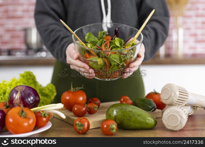 close up hands holding bowl