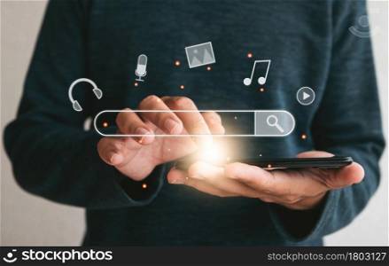 Close up hands holding smartphone. man working with smart phone and with blank search bar. Searching Browsing Internet Data Information Networking Concept