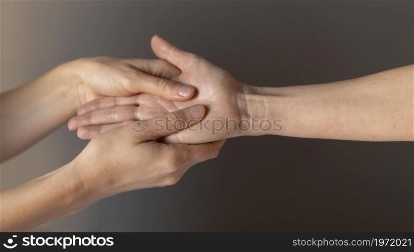 close up hands massaging palm. High resolution photo. close up hands massaging palm. High quality photo
