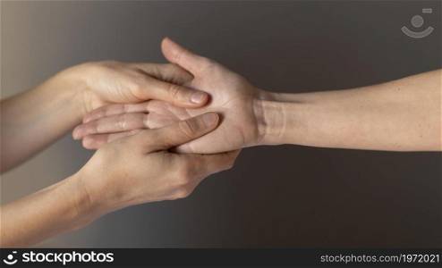 close up hands massaging palm. High resolution photo. close up hands massaging palm. High quality photo