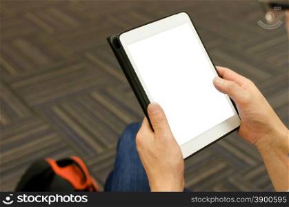 Close up hands multitasking man using tablet