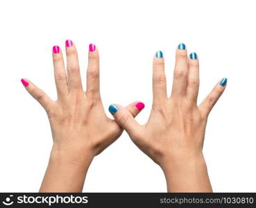 Close-up Hands of beautiful female with paint pink and blue nails on white background.