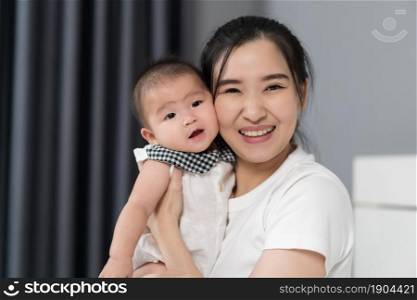 close up happy mother with baby newborn