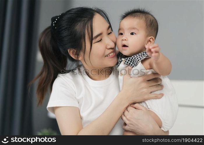 close up happy mother with baby newborn