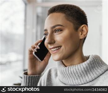 close up happy woman talking phone