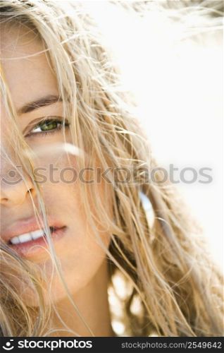 Close up headshot of pretty blond Caucasian woman.