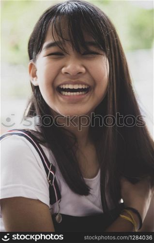 close up headshot teenager laughing