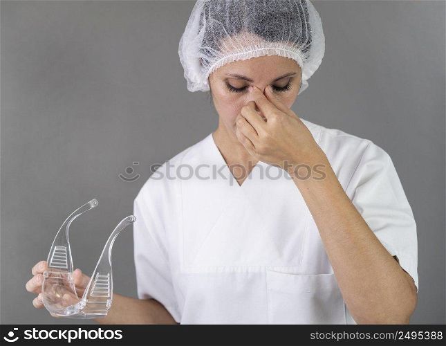 close up health worker with headache