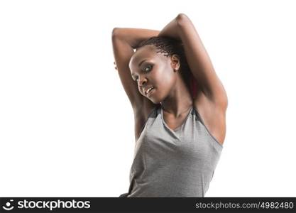 Close up image of african female in sports clothing relaxing and stretching after workout isolated on white background Image with copyspace for text