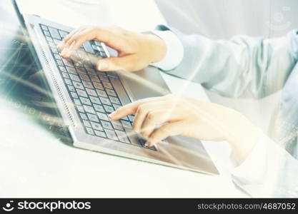 Close up image of businesswoman hands typing on keyboard. Businesswoman at work