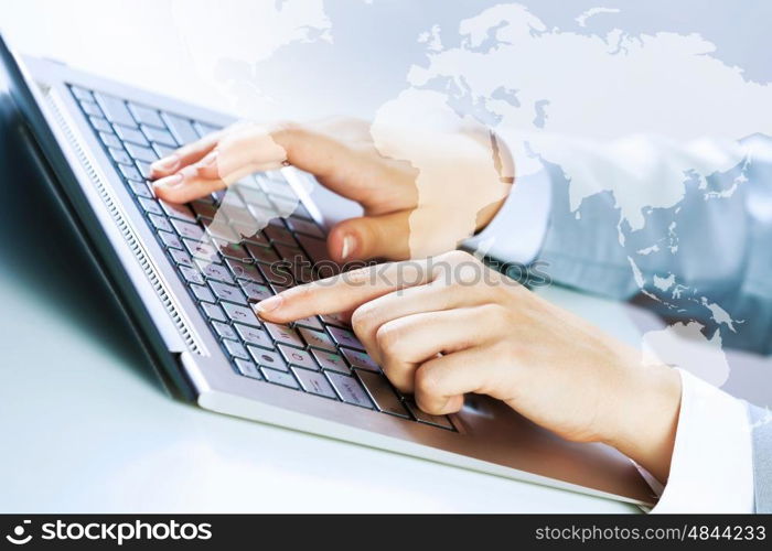 Close up image of businesswoman hands typing on keyboard. Businesswoman at work