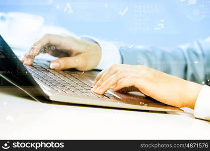 Close up image of businesswoman hands typing on keyboard. Businesswoman at work