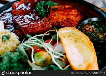 close up image of Pork rip steak with honey
