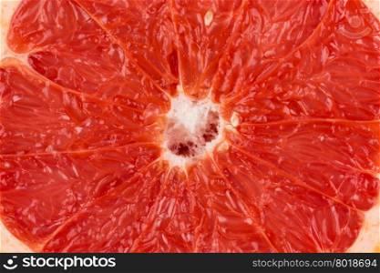 Close up image of sliced red grapefruit