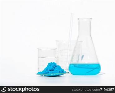 Close up inorganic chemical on white laboratory table. Copper(II) sulfate, alcohol. Chemical ingredient for Cosmetics & Toiletries product.