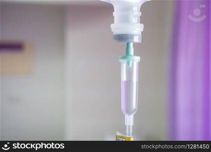 Close up iv fluid intravenous drop saline in hospital. iv fluid intravenous drop saline in hospital