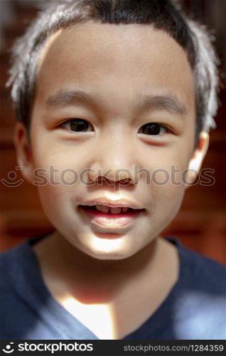 close up kidding face of asian children with happiness smiling