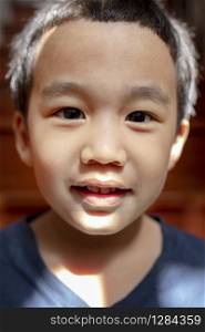close up kidding face of asian children with happiness smiling