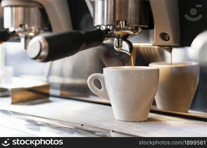 close up machine pouring coffee cup. Resolution and high quality beautiful photo. close up machine pouring coffee cup. High quality beautiful photo concept
