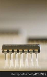 Close up macro of 14 pin microcircuit case.