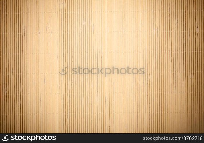 Close up macro of beige brown bamboo mat as striped background texture pattern. Oriental