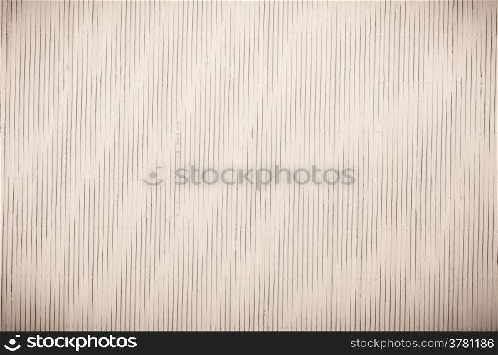 Close up macro of grey gray bamboo mat as striped background texture pattern. Oriental