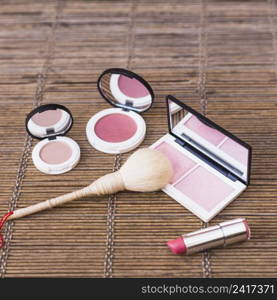 close up makeup brush lipstick blusher placemat