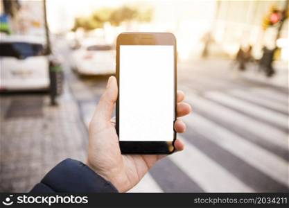 close up man s hand showing mobile phone with white screen display road