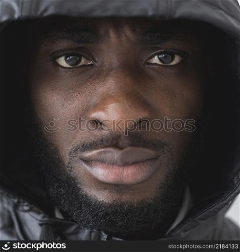 close up man wearing hoodie