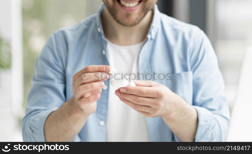 close up man with airpods