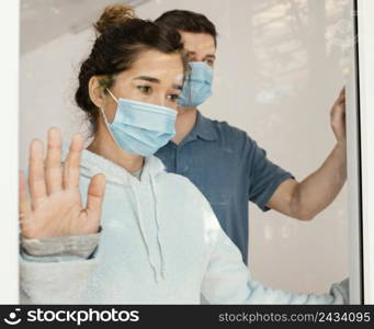 close up man woman with masks