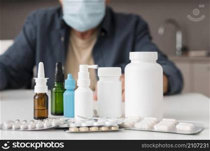 close up medicine containers desk