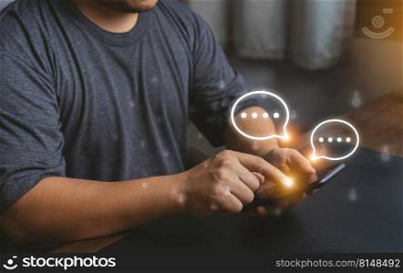 Close-up Men hands using mobile phone with chat icons. Man use smartphone chatting application and social network app. Social media application chat box.