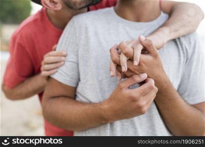 close up men holding hands. High resolution photo. close up men holding hands. High quality photo