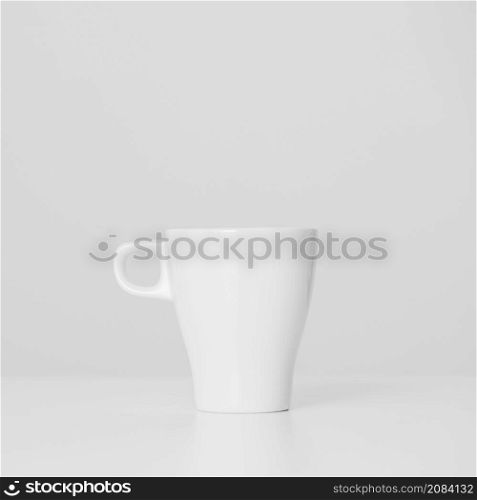 close up minimalistic white cup