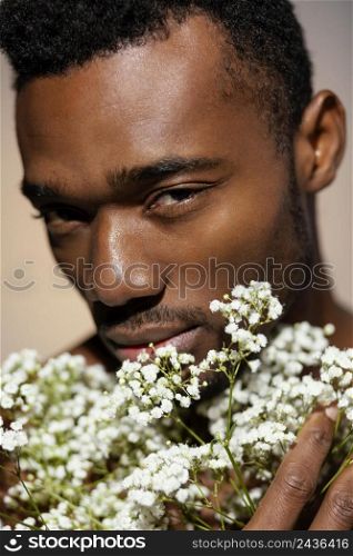 close up model holding flowers