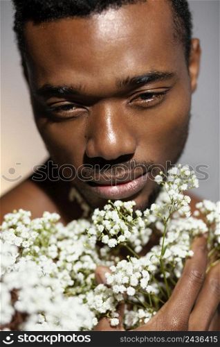 close up model holding flowers portrait