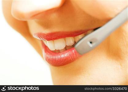 Close-up (mouth) of a friendly female call center operator