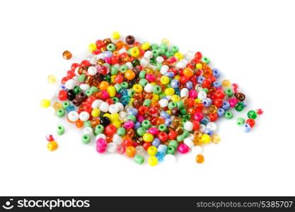 close up multi colored beads heap isolated on white