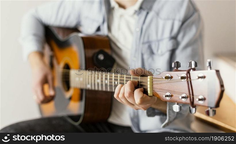 close up musician playing guitar. High resolution photo. close up musician playing guitar. High quality photo
