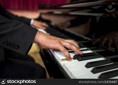close up musician playing piano