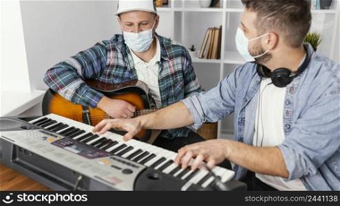 close up musicians wearing medical masks