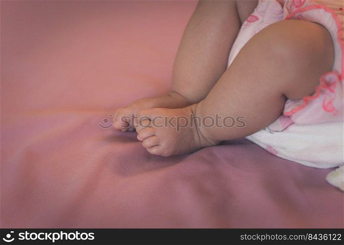 Close up newborn baby leg