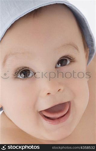 Close-up of a baby boy smiling