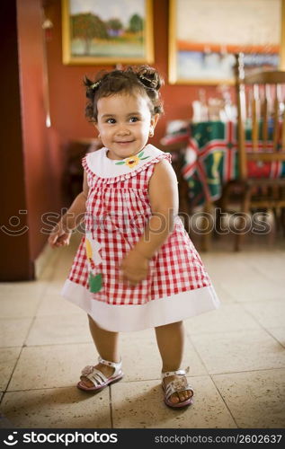 Close-up of a baby girl smiling