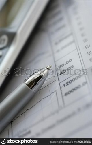 Close-up of a ballpoint pen on a document
