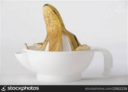 Close-up of a banana on a juice squeezer